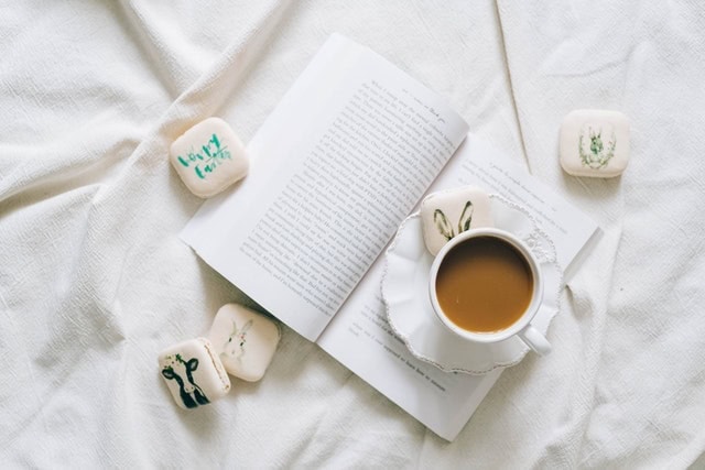 Cup of tea placed on a book Cup of tea placed on a book