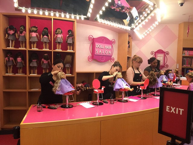 Grown adults doing doll hair all day long