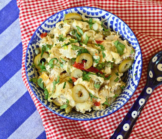 Old Bay Potato Salad has the flavor of Old Bay, and all kinds of goodness. If you love potatoes you will love this version of potato salad! #potatoes #potatosalad #salads #cookouts See More great food at: www.thisishowicook.com