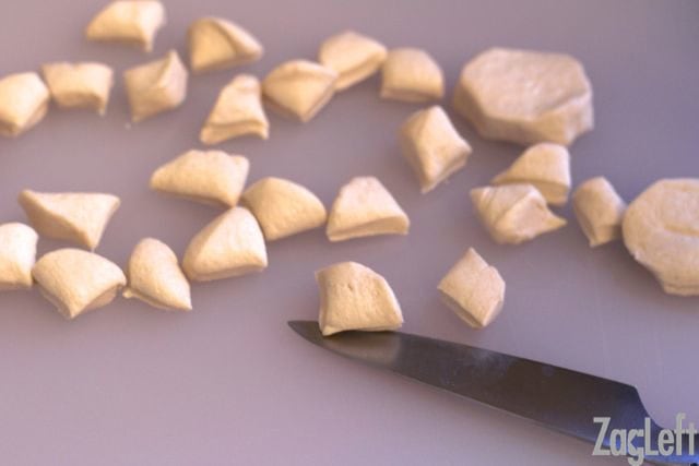 Biscuit dough cut into little triangles