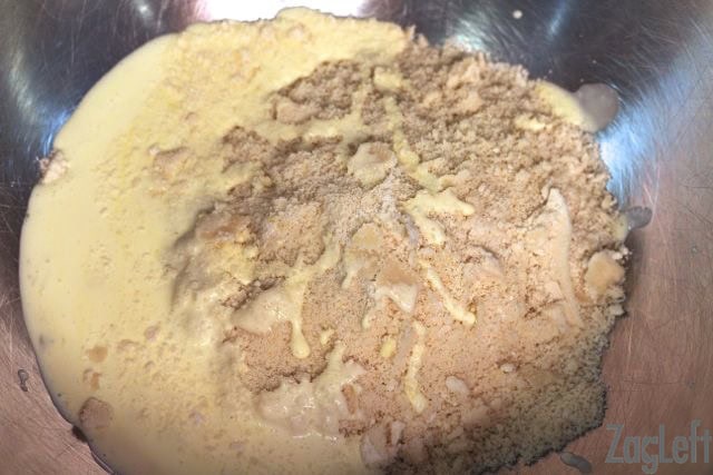 Dry ingredients with butter, egg, and cream in a large bowl