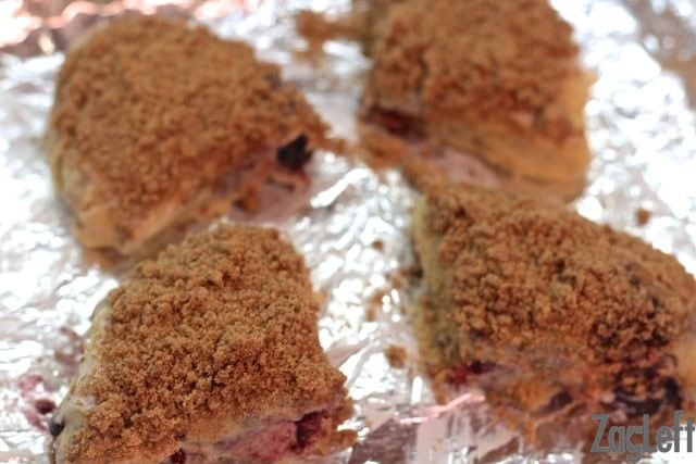 Four scones on a small baking sheet
