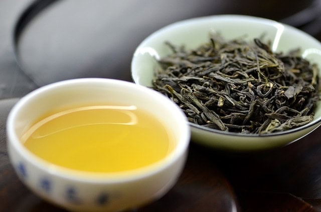 cup of yellow tea cup of yellow tea