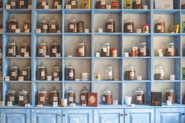 jars of tea on a shelf cabinet jars of tea on a shelf cabinet