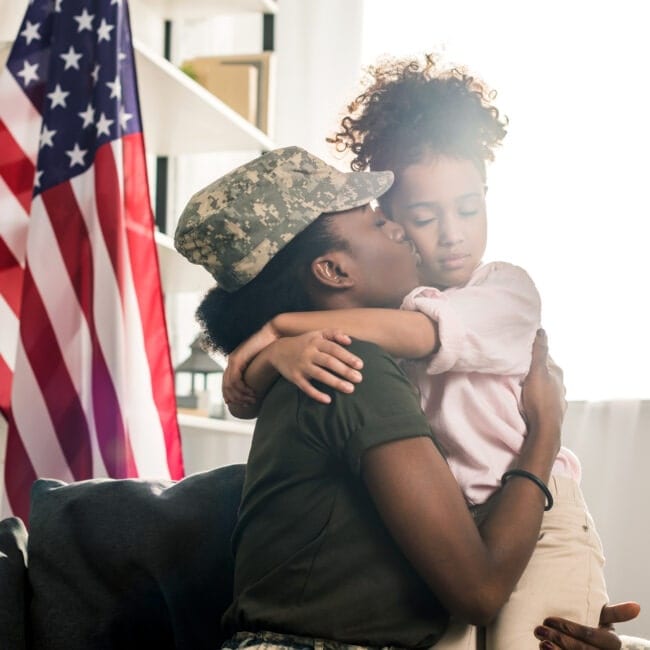 Female Military Service Member with Daughter