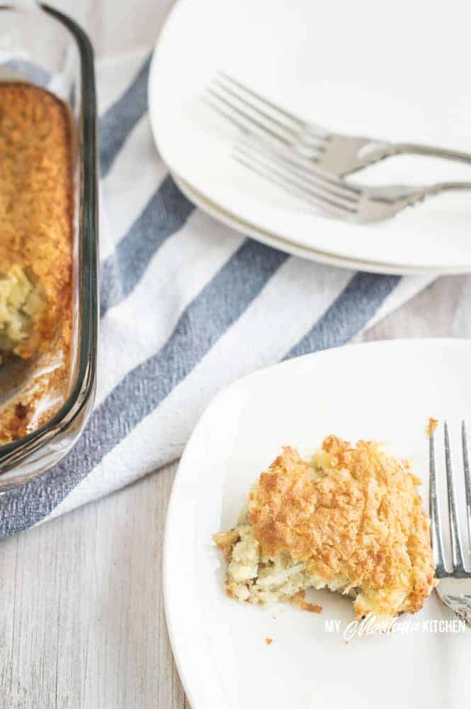 These low carb coconut custard bars are the perfect treat to curb those sweet cravings. This easy keto coconut dessert is also paleo, dairy free, and make with coconut condensed milk. #lowcarbcoconutbars #paleococonutbars