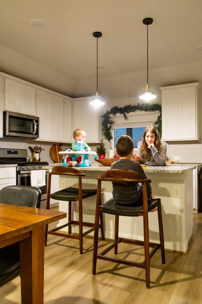 kitchen with young boys eating breakfast at an island