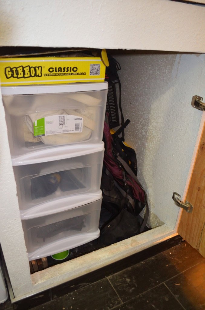 And below the pantry I have some paint and all my camping/hiking/climbing gear, I put another set of shelves in there for diapers and such too!