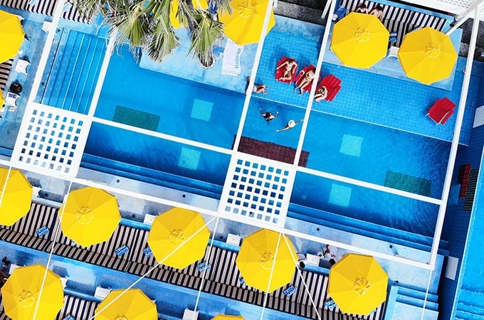 Tropicola burst onto the Bali Beach Club scene last year with a vibrant, retro-chic offering. With two pools, three bars and an open woodfire kitchen, it has your lounging needs covered. A restaurant, rooftop bar and accommodation are in the works for the venue. - Seminyak