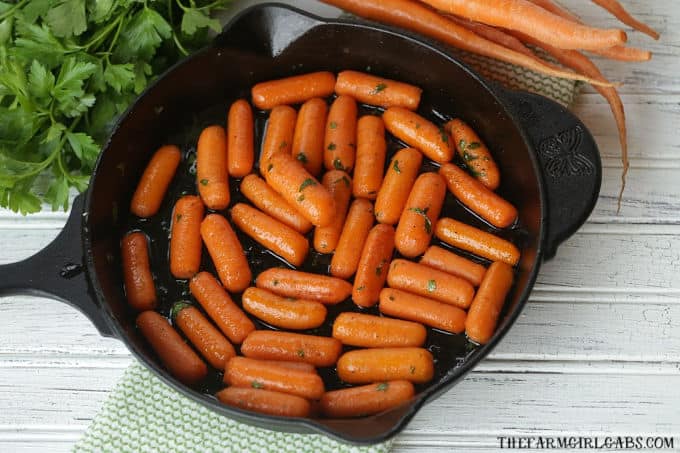 These Honey Glazed Carrots are a simple side dish to serve for any meal. They make a great holiday recipe for Thanksgiving and Easter too. #Carrots #SideDish #VegetableRecipe #Thanksgiving #HolidayRecipe