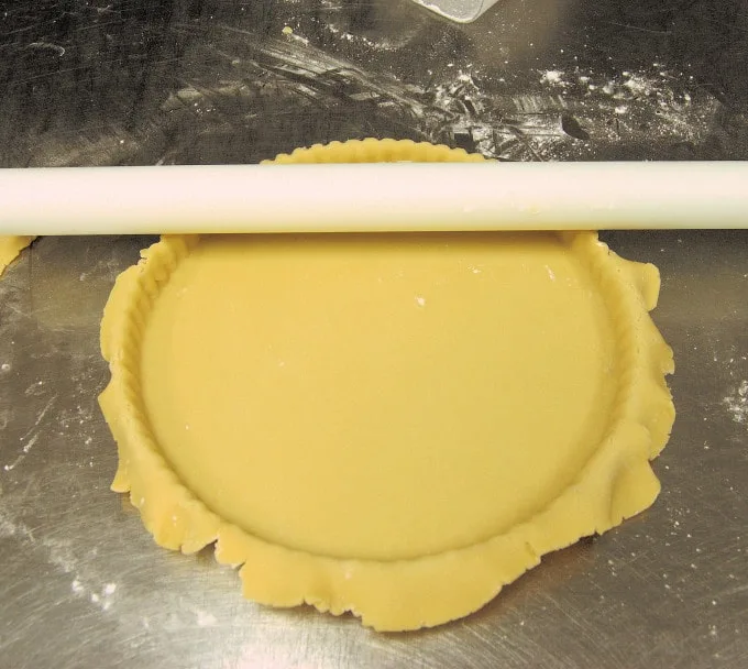 a tart pan lined with dough