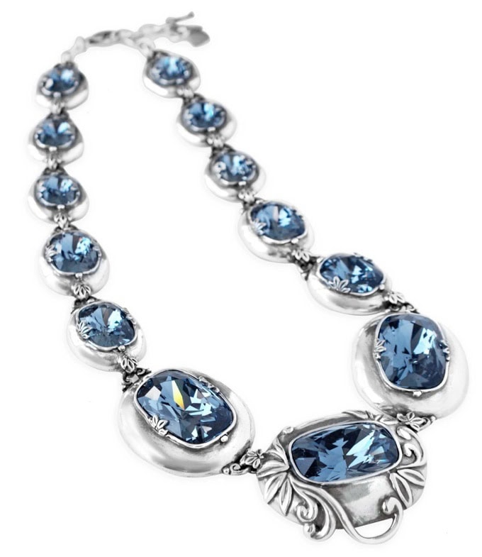 Lily Rose couture necklace featuring spellbinding cushion-cut denim blue Swarovski crystals and burnished silver ethereal accents. Finished with lobster clasp fastening.
