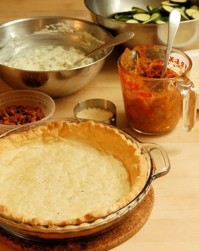 all the components of zucchini pie ready for assembly