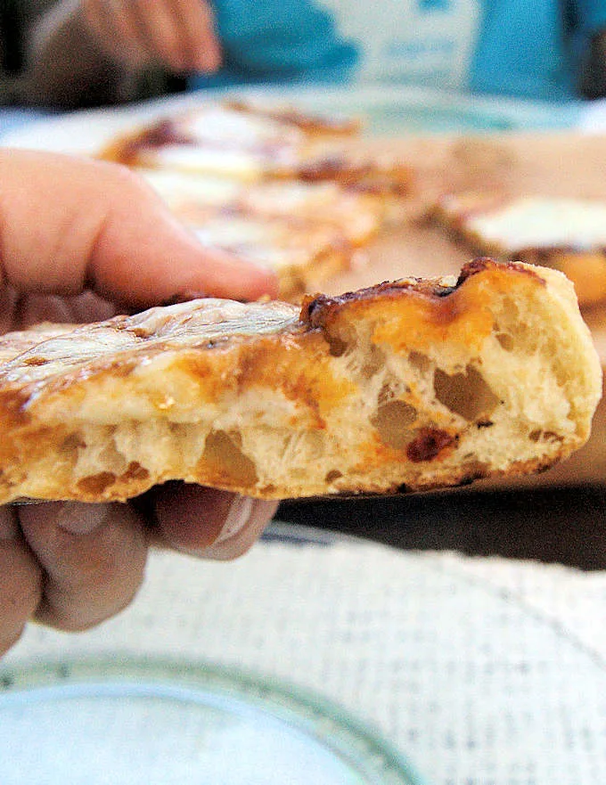 the interior of a slice of pizza