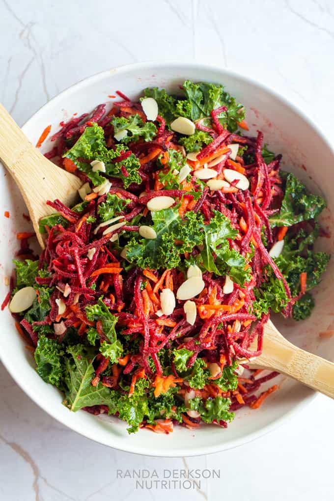 raw beet salad with carrots and kale