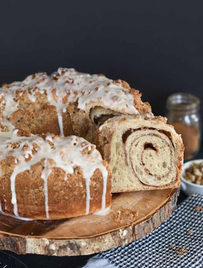 a sliced sourdough coffee cake on a cake stand