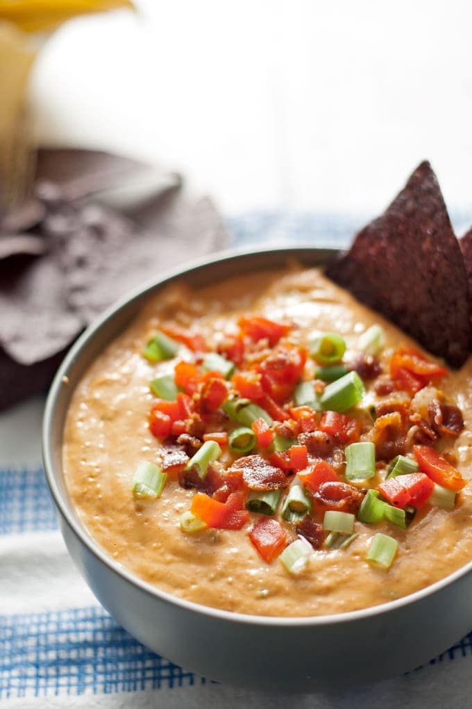 Make this hot pimento cheese dip the next time you are throwing a party or tailgating! It's the perfect fun appetizer! | honeyandbirch.com