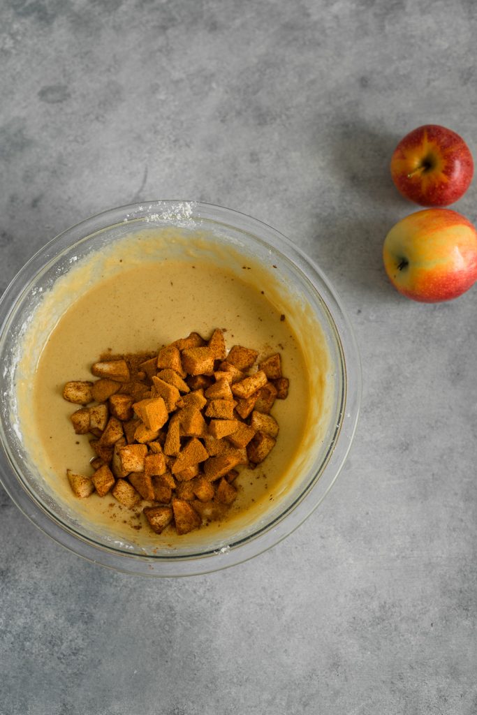 the wet and dried ingredients are combine and the chopped apple with cinnamon is now added.