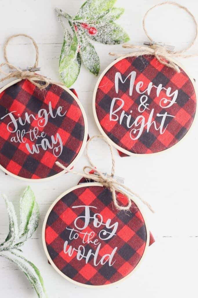 Homemade Christmas ornaments add a special touch to your tree. Add a farmhouse flair and make some Buffalo Plaid Hoop Ornaments. It's an easy Cricut Christmas craft.