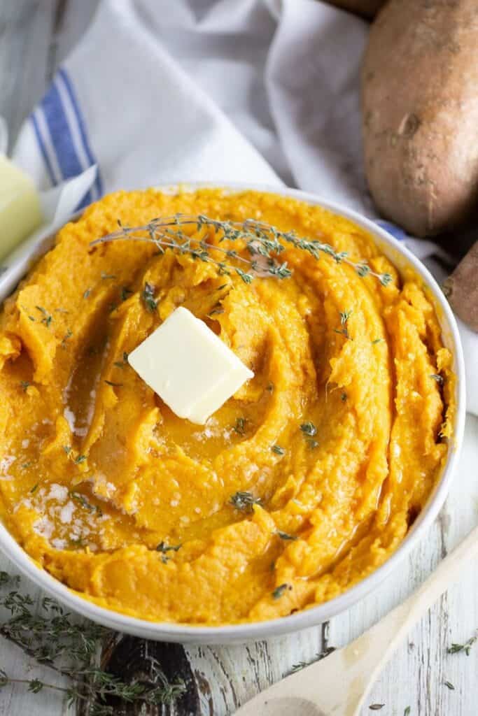Save room on your plate for this Savory Mashed Sweet Potatoes recipe. This is an easy sweet potato recipe for Thanksgiving. If you love sweet potatoes, your family will love this easy mashed potato recipe.