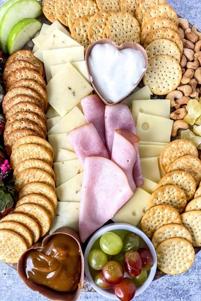Charcuterie Board It's time to graze and snack. Learn How To Make An Easy Charcuterie Board for your party that your guests will love! Charcuterie boards are a popular food trend.