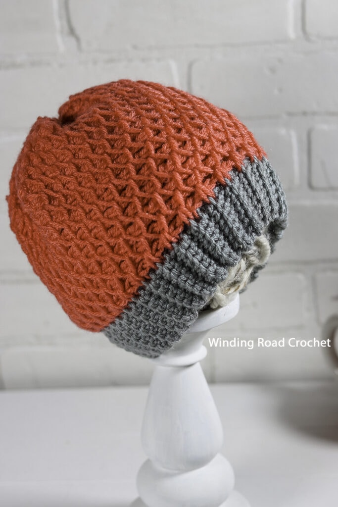 Learn all the basics of Tunisian crochet with this free online course. In lesson 7, we learn the diamond-patterned Tunisian Smock stitch.