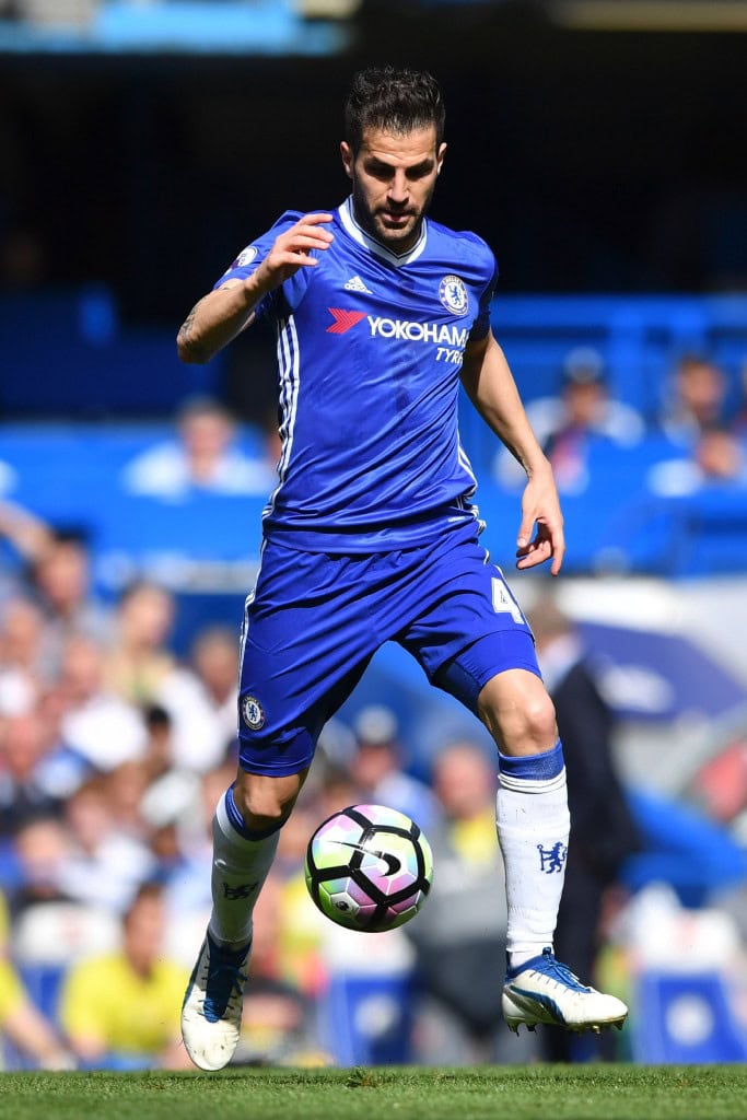Chelsea's Spanish midfielder Cesc Fabregas controls the ball during the English Premier League football match between Chelsea and Sunderland at Stamford Bridge in London on May 21, 2017. / AFP PHOTO / Ben STANSALL / RESTRICTED TO EDITORIAL USE. No use with unauthorized audio, video, data, fixture lists, club/league logos or 'live' services. Online in-match use limited to 75 images, no video emulation. No use in betting, games or single club/league/player publications. / (Photo credit should read BEN STANSALL/AFP/Getty Images)