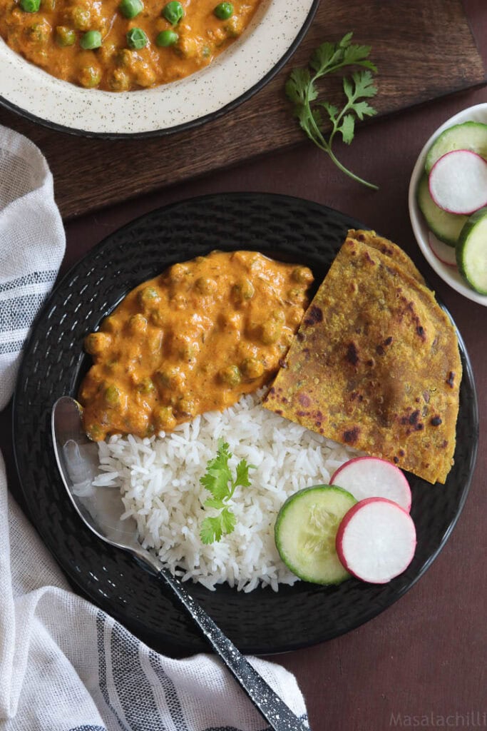 Vegan Green Peas Curry served with steamed rice, roti and salad