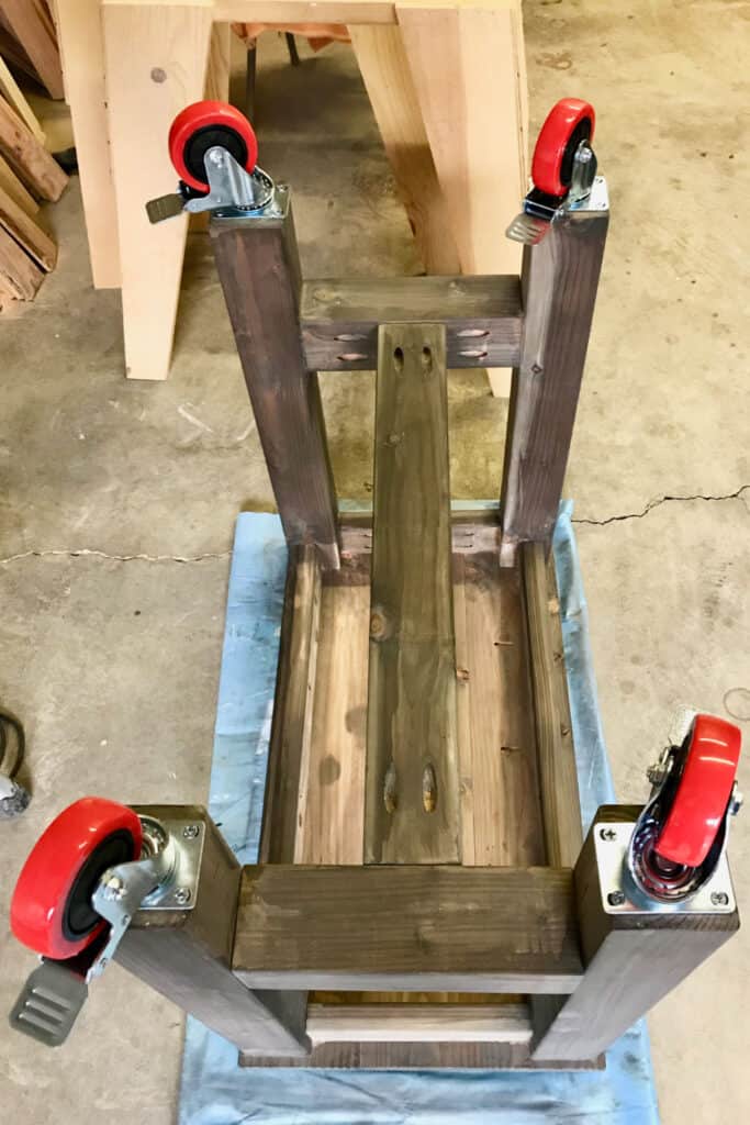Wheels attached to table legs.