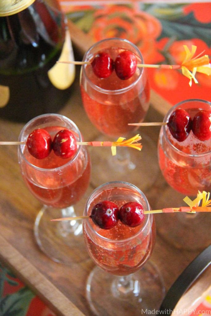 Cranberry Watermelon Champagne Cocktail | Holiday Cocktails | Cranberry Cocktails | Champagne Cocktails | www.madewithhappy.com