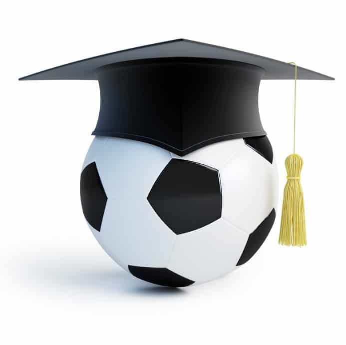 a football ball with a graduation hat
