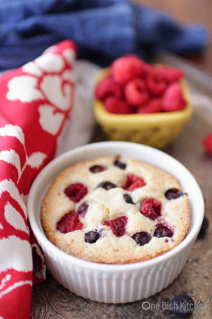 This buttery, berry topped coffee cake recipe is ideal for times when you'd like a little something sweet. Easy to make and the perfect size for one person. Perfect for breakfast or dessert and will surely satisfy a sweet tooth. | One Dish Kitchen
