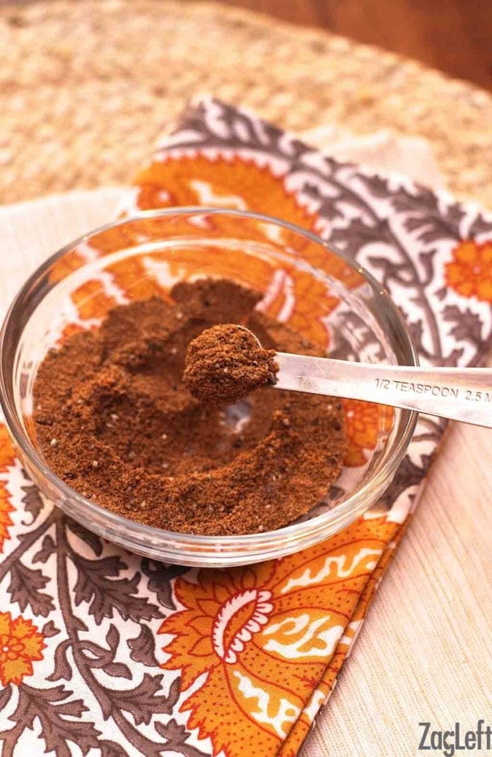 garam masala on a measuring spoon