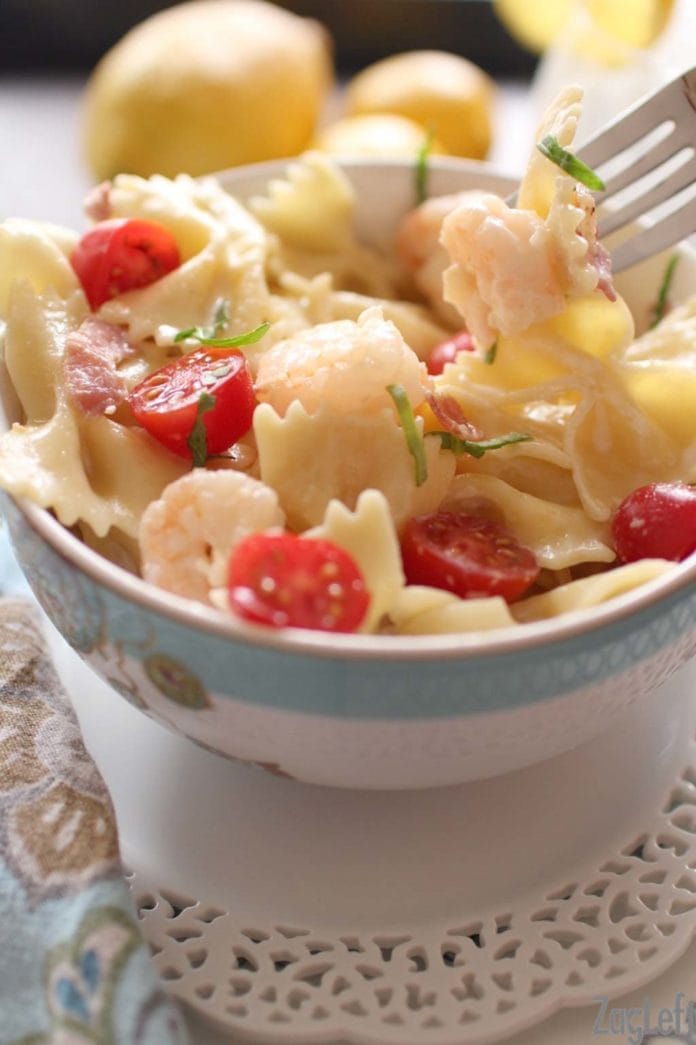 bowl of pasta with shrimp and prosciutto