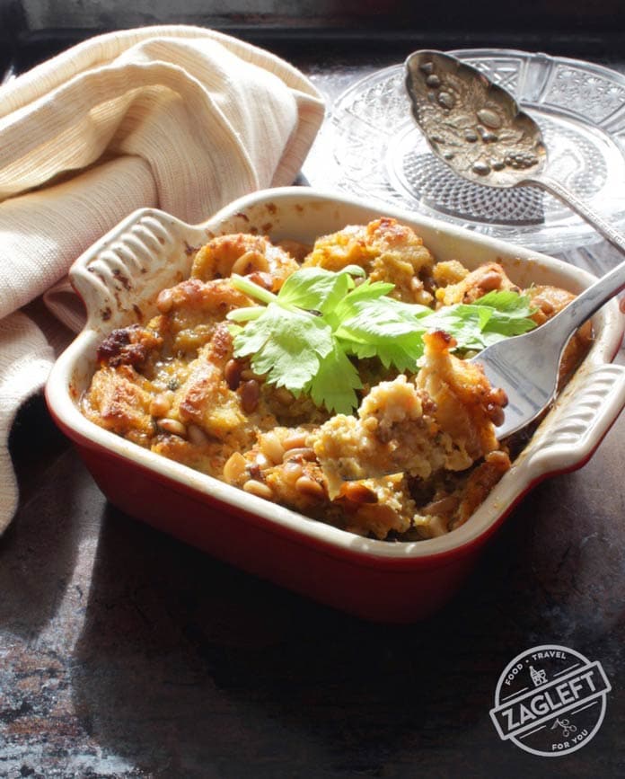 A forkful of sausage dressing from the mini baking dish