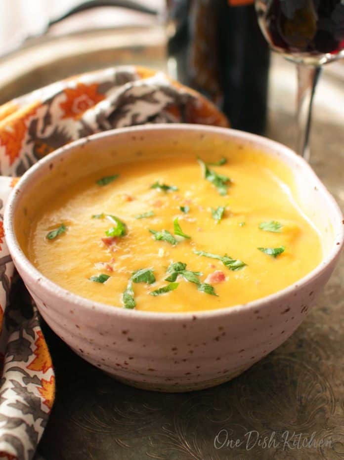 bowl of butternut squash soup on a tray made in an Instant Pot | One Dish Kitchen