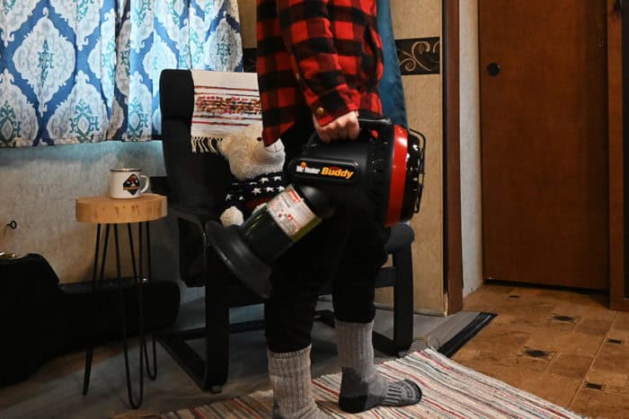 You can carry the Little Buddy heater by the handle when it's not lit. Mr. Heater Little Buddy Heater being carried by the handle