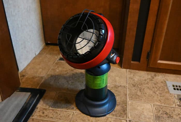 The Little Buddy heater is portable, small, and can be used both inside and outside. Mr. Heater Little Buddy Heater sitting on the floor inside an RV