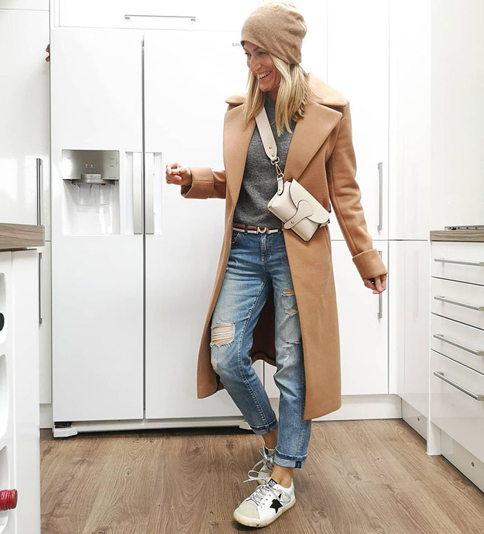 Abi wears a beige beanie to match her coat | 40plusstyle.com