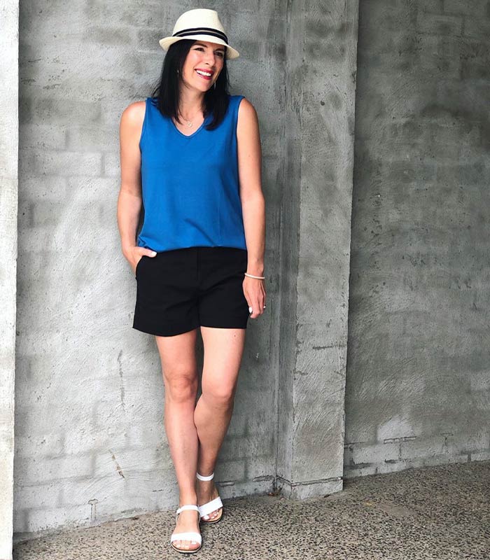 black shorts with a cobalt blue top | 40plusstyle.com
