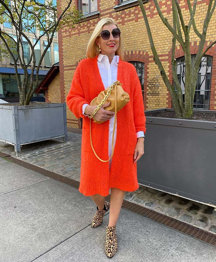How to wear booties - Nadine wears leopard print booties with a long cardigan | 40plusstyle.com