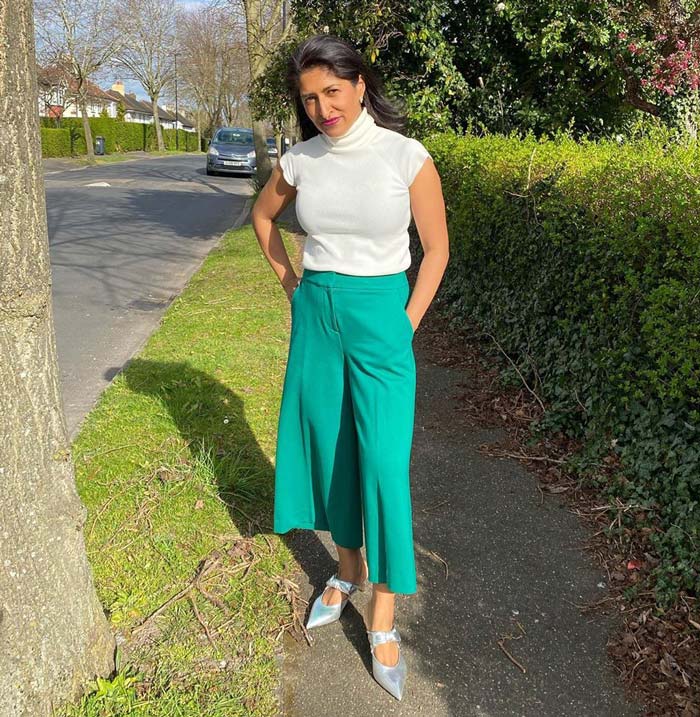 white top with green pants and silver shoes | 40plusstyle.com