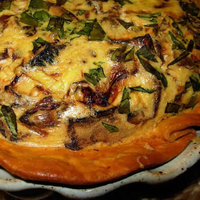 Beautiful and delectable. Wild Mushroom Gruyere Quiche.