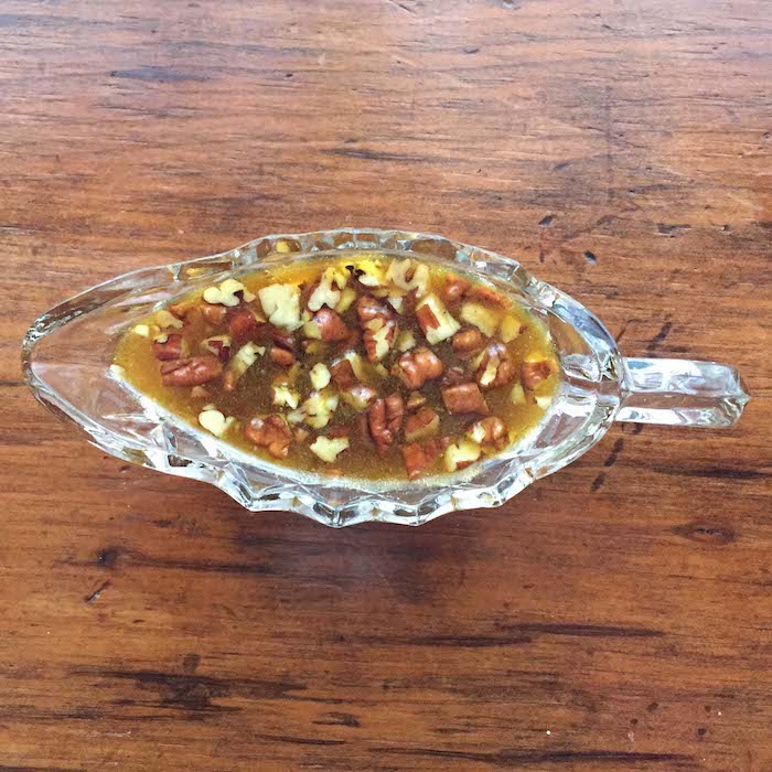 Molasses Honey Vinaigrette with Chopped Pecans is sweet and tangy.