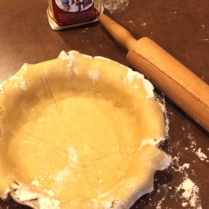 Ready to crimp the edges. For an unbaked pie like Lemon Meringue, prick the crust a few times before baking. Add pie weights or beans to maintain shape. (That is, you have to bake the pie crust before filling with the Lemon Meringue). For Pumpkin Pie, however, you just fill it and bake it with the filling. (No pricking.)
