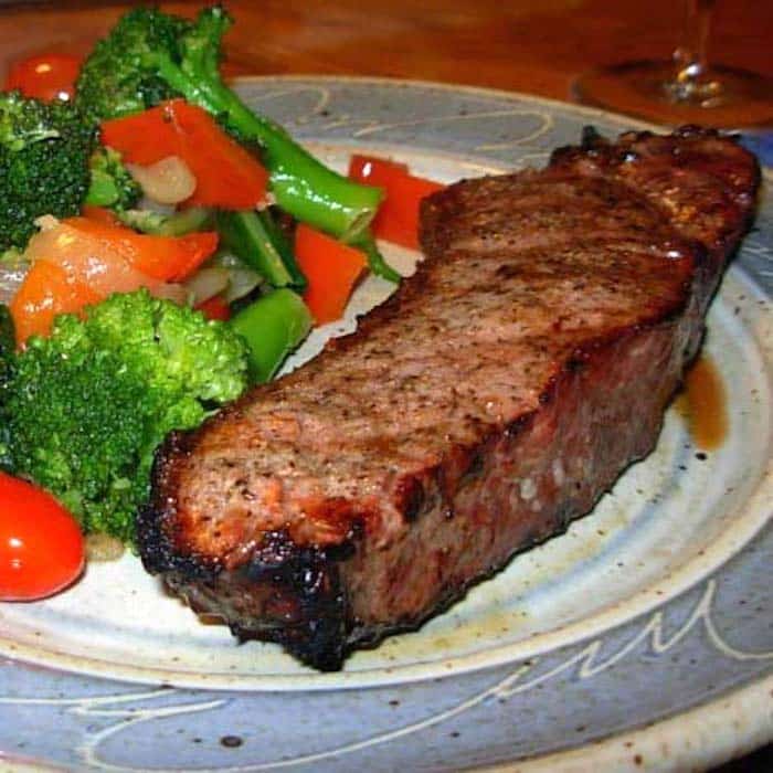 A NY Strip Steak (or any steak) is easy to cook at home.
