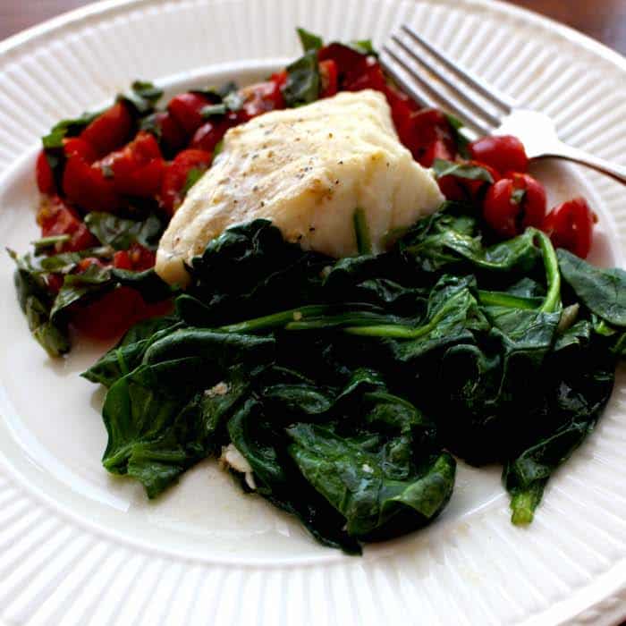 Sautéed Spinach is so good with cod and Tomato Basil Chutney.
