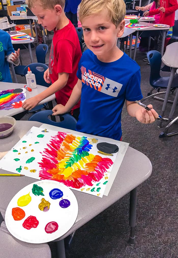 1st Grader painting rainbow. St. Patrick's Day Rainbow Art Project. Looking for St. Patricks Day Art for 1st Graders, then we have the perfect project. 1st Grader painting rainbow. St. Patrick's Day Rainbow Art Project. Looking for St. Patricks Day Rainbow Art for 1st Graders, then we have the perfect project.