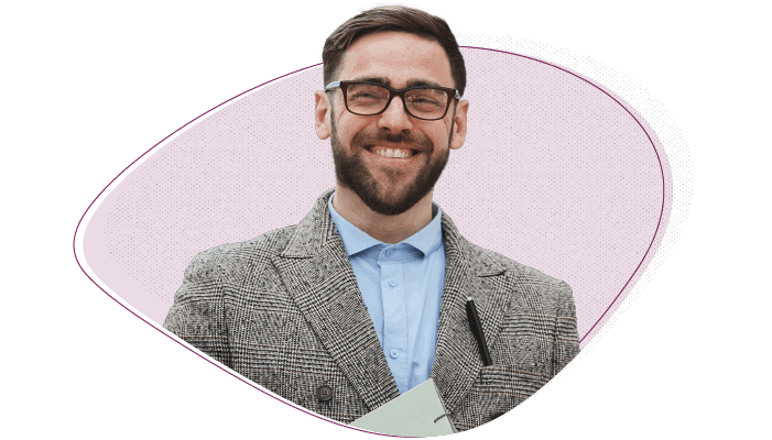 HeroImages_WIDE_property-management-marketing-budget smiling multifamily executive | PERQ Company
