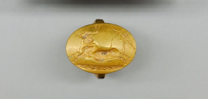 Gold ring with a Cretan bull-jumping scene was one of four solid-gold rings found in the tomb. (Photo: Department of Classics/University of Cincinnati)